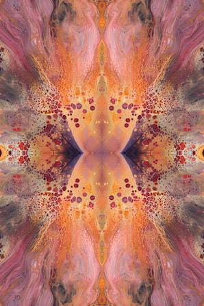 an abstract image of an orange and pink flower
